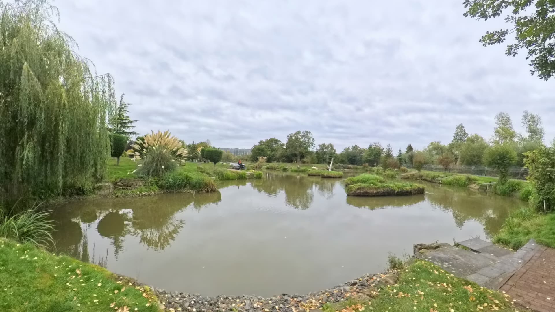 View across Walters Pond and its landscaped banks